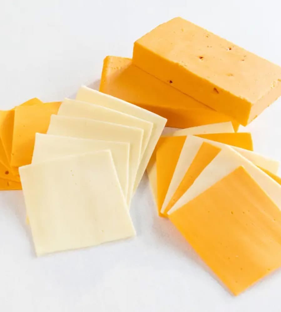 Processed cheese slices and a block